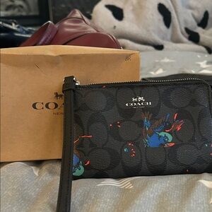 Coach Black Wristlet with Blue and Red Design